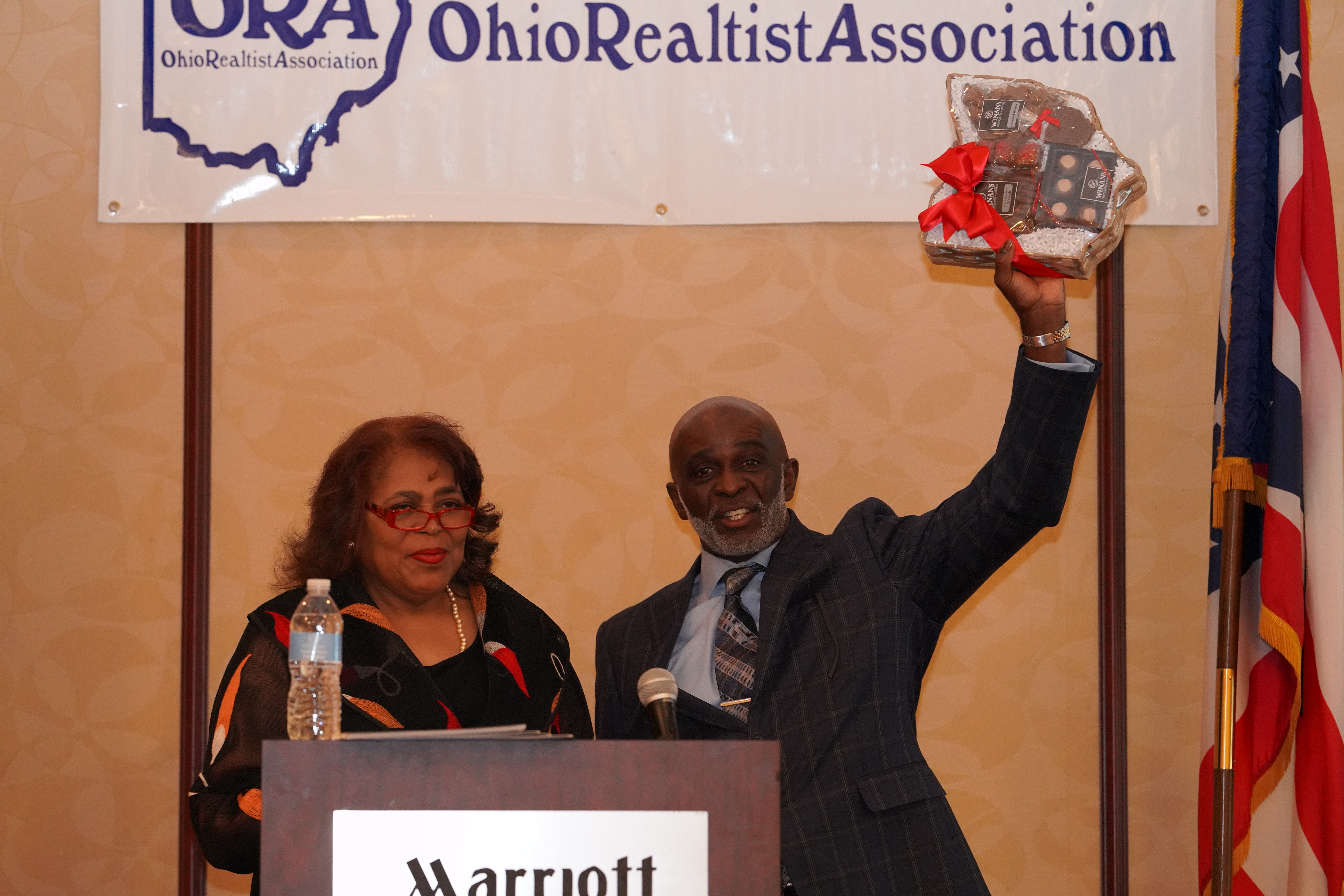 Mark Alston accepting gift from ORA